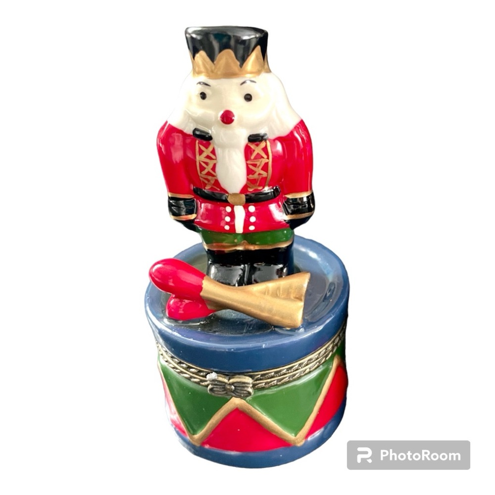 Nutcracker on drum - hinged pill/trinket box - 4” x 1 7/8” - ceramic - sm. flaw
